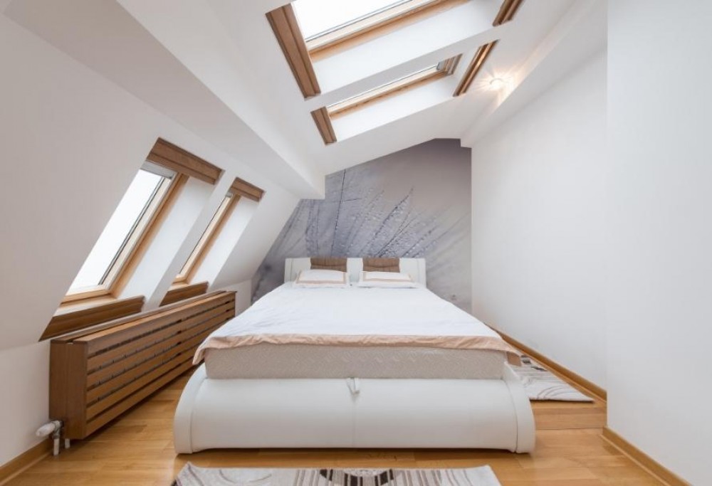 ontwerp van een slaapkamer op zolder