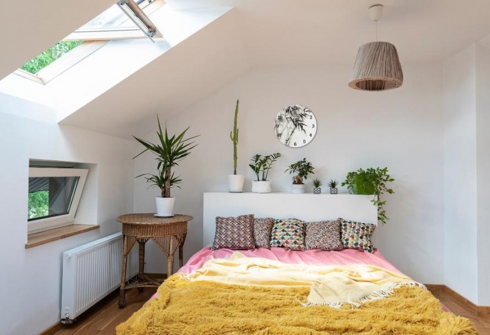 inrichting van een slaapkamer op zolder