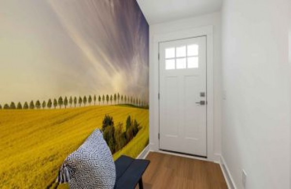 Wallpapers voor een donkere gang en hal: hoe je het juiste interieur kiest en creëert