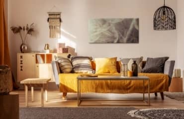 Woonkamer in Boho-stijl - arrangementen en inspiraties voor een artistieke metamorfose van het interieur